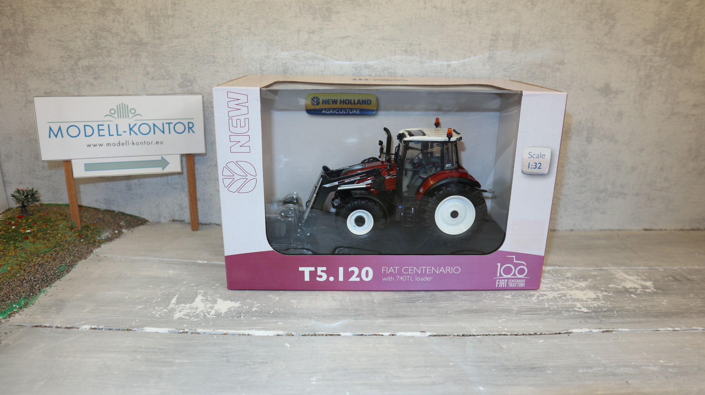 Universal Hobbies UH 6206 in 1:32,  New Holland T5.120 braunmetallic mit Frontlader,  Neu in OVP