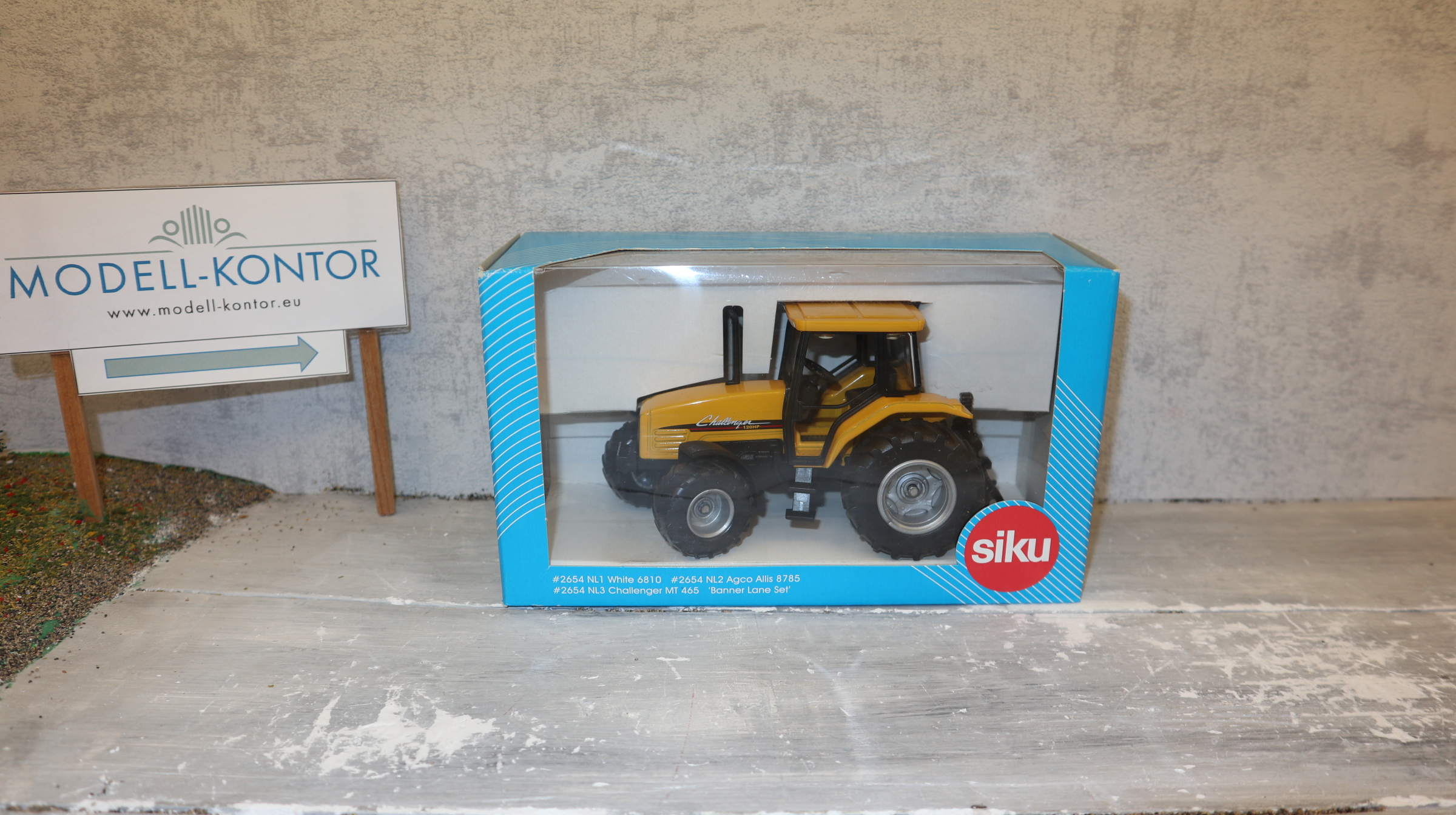 Siku 2654 in 1:32, Challenger MT 465 gelb, US-Modell,  NEU in OVP
