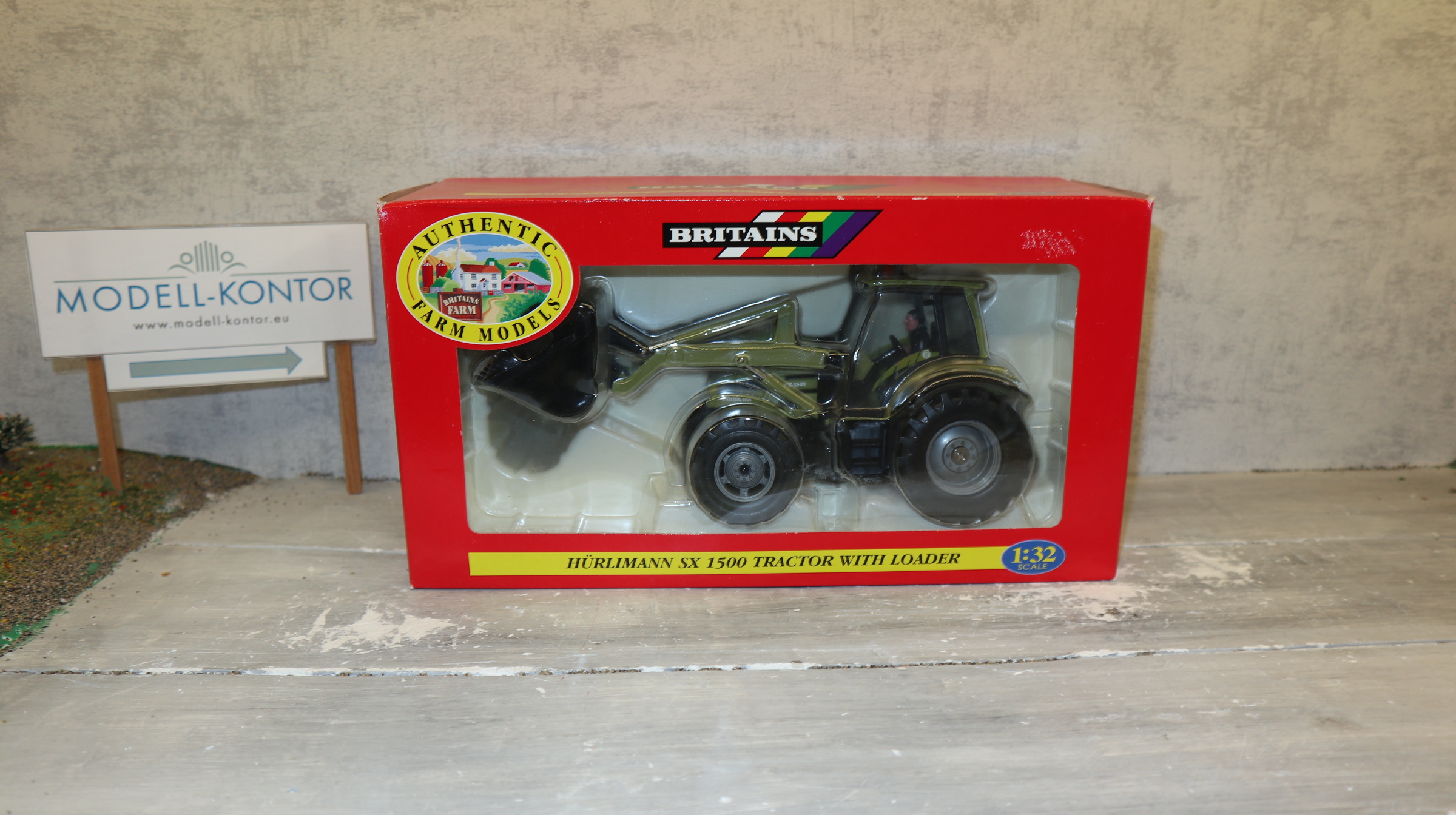 Britains 00039 in 1:32, Hürlimann SX 1500 mit Frontlader, NEU in OVP