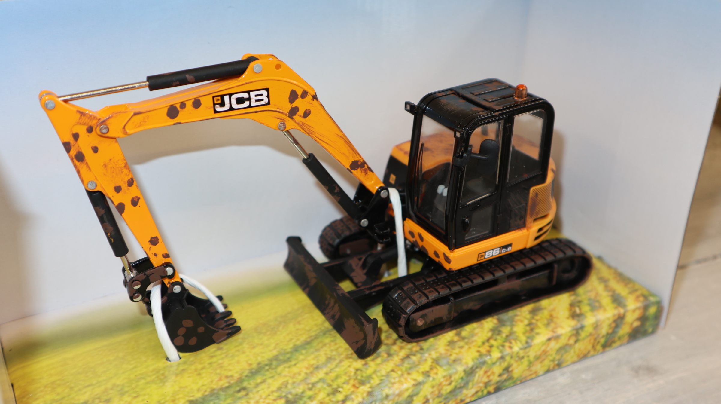 Britains 43279 in 1:32,  Kettenbagger JCB Midi MUDDY, NEU in OVP
