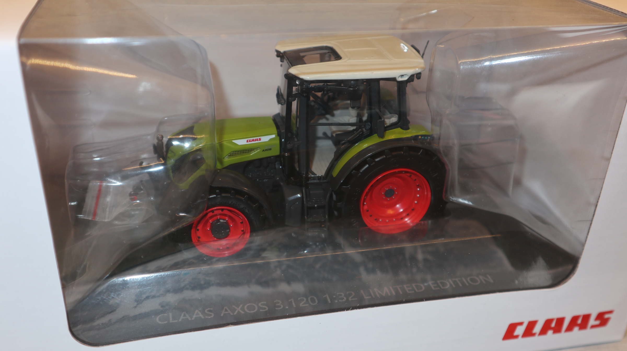 ROS 02675190 in 1:32, Claas Axos 3.120 mit Fronthydraulik, NEu in OVP