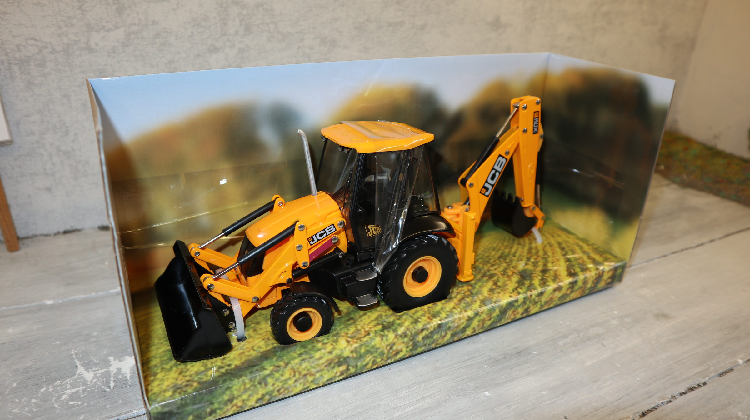 Britains 42702 in 1:32,  JCB 3CX Bagger-Lader, NEU in OVP