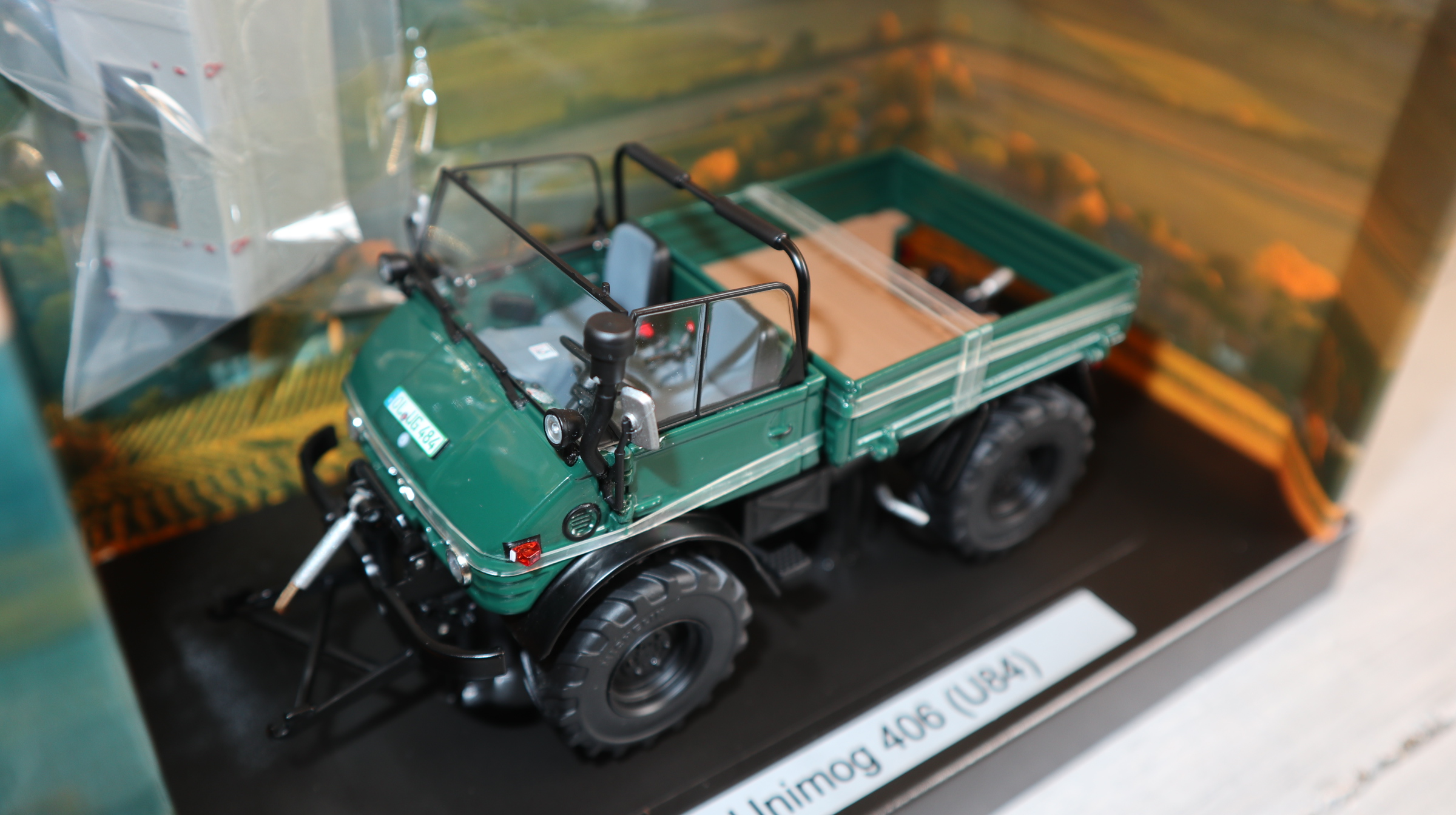 Weise Toys 1048 in 1:32, UNIMOG U406 dunkelgrün mit Faltdach,  NEU in OVP