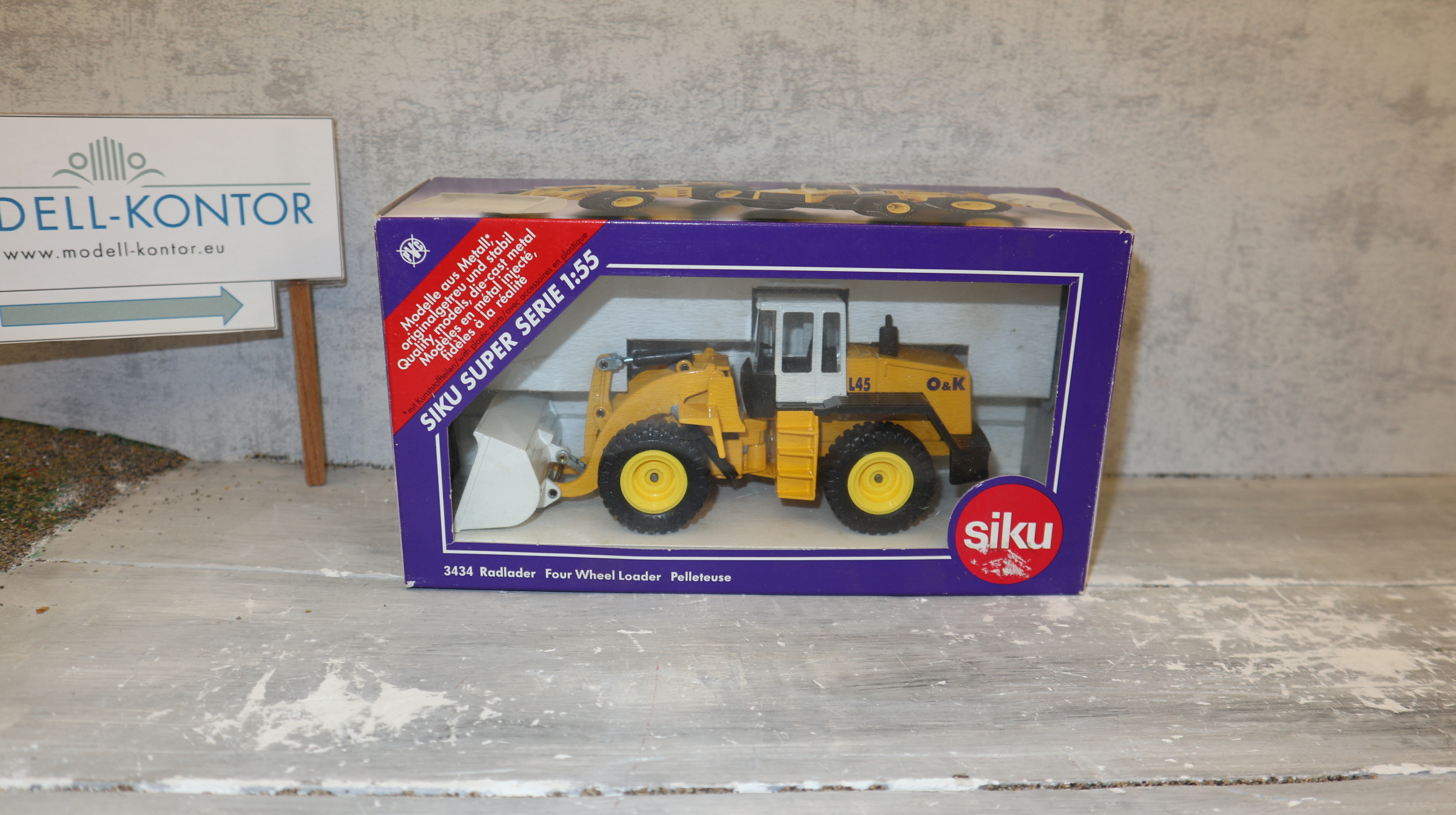Siku 3434 in 1:55, Radlader O&K L45 in gelb-schwarz, NEU in OVP